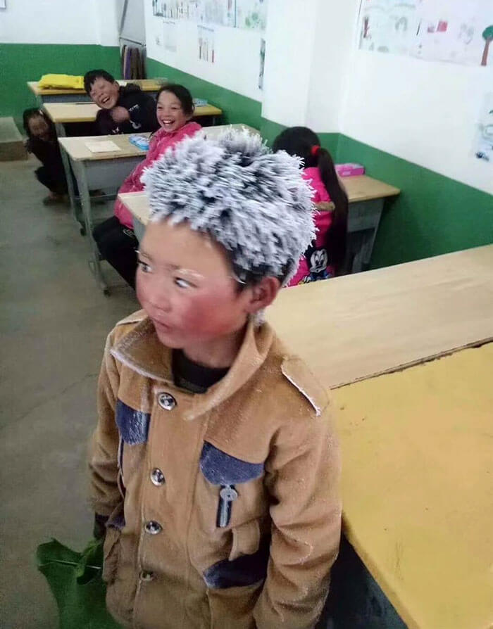 inspiringlife.pt - Menino de 8 anos anda cerca de 5 km no meio de neve para não perder exame na escola