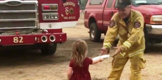 Menina distribui comida aos bombeiros durante um grave incêndio na Califórnia