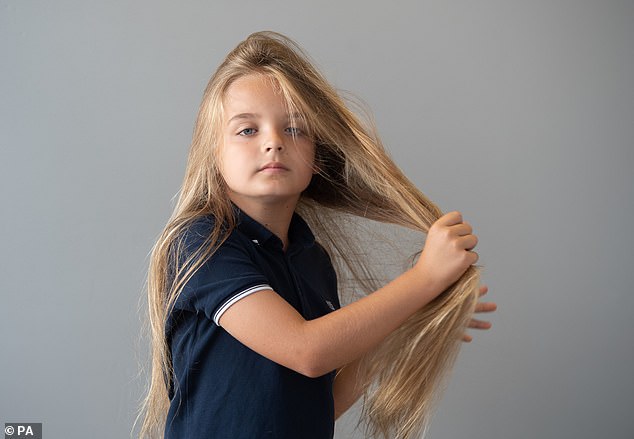 inspiringlife.pt - Menino deixa seu cabelo crescer por nove anos para doar a crianças com câncer