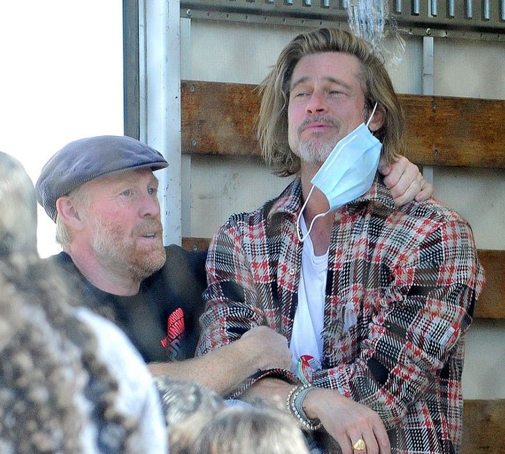 inspiringlife.pt - Brad Pitt foi fotografado a levar comida e ajuda aos necessitados