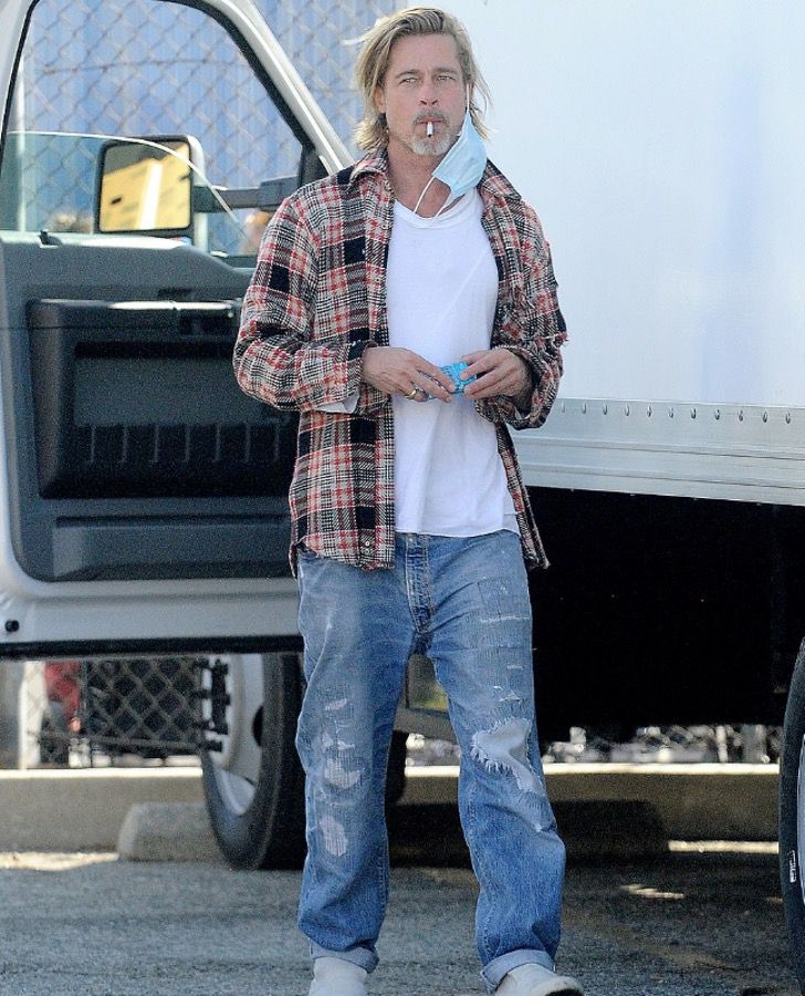 inspiringlife.pt - Brad Pitt foi fotografado a levar comida e ajuda aos necessitados